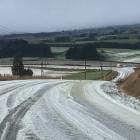 Snow on the road in Wyndham-Letterbox Road this morning. Photo: Southland District Council
