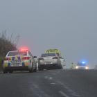 Emergency services attend a car crash on Highcliff Rd. Photo: Gregor Richardson