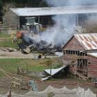 The fire completely destroyed a shed and spread to other farm buildings. Photo: John Cosgrove 