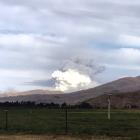 Smoke rises from the out of control burn-off near Mt Dasher. Photo: Ashley Smyth