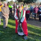 Canterbury Anglican Bishop Peter Carrell​ gets work started at the Most Holy Trinity Church site...