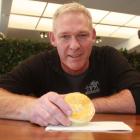 The Barn manager Adam Wilson holds one of the wallaby pies, which are proving popular with...