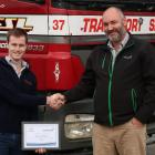Opio’s Matthew Blomfield, a bulkie driver for Transport Services Ltd, receives his 2020 New...