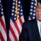 US President Donald Trump speaks during a news conference at Trump National Golf Club in...