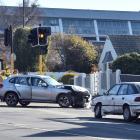 Two cars crashed at the intersection of Stuart and London Sts today. Photo: Peter McIntosh