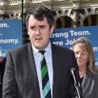 National Party transport spokesman Chris Bishop (centre) announces the party’s 
...