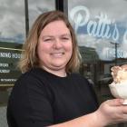 Patti’s and Cream owner Olive Tabor with a few scoops of her ice cream outside her new shop...