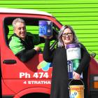 Rainbow Paints owners Paul and Karen Beres out the front of their new location on Strathallan St....