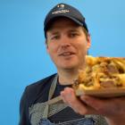 Hungry Hobos owner Romeo Dowling-Mitchell, of Mornington, and his Bat Out of Hell sandwich — a...
