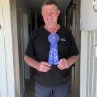 Donald ‘‘Dusty’’ Mould with his New York State Fair shearing award. PHOTO: GEORGE CLARK