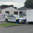 A scene examination is taking place on Grace St where a woman was found dead. Photo: Abbey Palmer