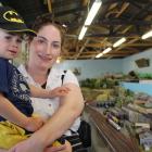 Gore residents Michaela Goodman and Arthur Prattley (2)  check out model layouts at the 36th...