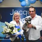 Returning Waitaki MP Jacqui Dean celebrates her win with husband Bill and Jimmy the dog in Oamaru...