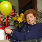 Luce Wilsens enjoys her flowers from Kamana Lakehouse staff. PHOTO: GUY WILLIAMS
