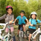 About to tackle a new bike trail on the Shotover River delta are (from left) Esther Nai (6),...