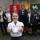 Kavanagh College enviro prefect Rosa Latton (17, front) and the school's enviro group (back from...