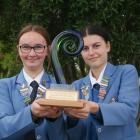 Queen's High School pupils Caitlyn Petrie and Tessa Conijn (both 16) hold the school's enviro...