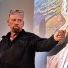 Ray Beattie speaks at the Taieri Mouth bar meeting last night. PHOTO: PETER MCINTOSH
