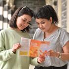 Sisters Mansoureh (left) and Somayah Sadeghi are preparing to vote for the first time in their...