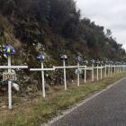 White crosses line the road to the Pike River Mine in tribute to the 29 miners who died when the...
