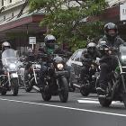 Motorcyclists head down Stuart St, towards the Dunedin Railway Station, during a motorcycle run...