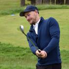 Otago player Brandon Hodgson practises his chip shots at the Otago Golf Club last week. PHOTO:...