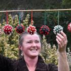 Dunedin artist Emma Hogg has crocheted ‘‘Covid balls’’ made out of wool and cotton. PHOTO: PETER...