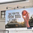 A billboard in Great King St, Dunedin, advertising the Work the Seasons scheme which was first...