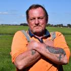 Regent St resident Wayne Hamlin is sad to learn the green fields behind his house will be...