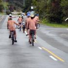 Southern Free Beaches members cycle in a pack as part of the World Naked Bike Ride in Waitati in...