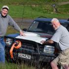 Taieri Rotary Club members Colin Brown (left) and Lindsay Strong, both of Mosgiel, read a map in...