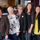 Dunedin Community Builders members and speakers gather before Tuesday’s launch of the Funding for...
