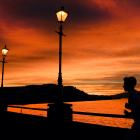 A runner jogs along the Steamer Basin in Dunedin as the sun rises. PHOTO: STEPHEN JAQUIERY