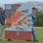 Marco Brenna (left) and Mike Palin, of the University of Otago geology department, with a map...