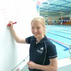 High-achieving Gore teenager Natalia Hamilton prepares to coach young swimmers at the town's...