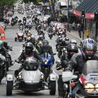 Motorcyclists enter the Octagon as part of the Bronz Otago toy run.
