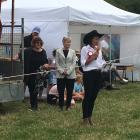 Christchurch Mayor Lianne Dalziel watches while show president Tania Kiely addresses the crowd,...