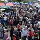 Crowds swarm at the Otago Farmers Market at noon yesterday. Photos by Jane Dawbert.