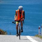 Steve Moffatt (70) heads for the summit on his bike.
PHOTO: MARK PRICE 

