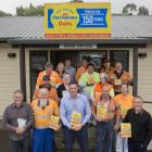 Harraways staff in front of the company’s head office in Green Island this week. Chief executive...