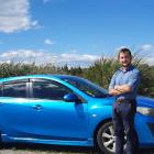 Jesse Miller with his Mazda Axela car in Lumsden, during his holiday road trip to Dunedin. PHOTO:...