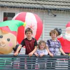 Bryant siblings (from left) Sebastian (7), Sophia (3), and Wyatt (8) love to decorate their home...