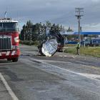 A tank full of bitumen fell off a truck when it crashed and rolled in Southland yesterday. That...