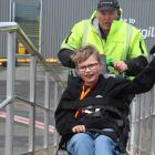 Air New Zealand staff help Invercargill youngster Evelyn Jones-Carran (12) on to the plane at...