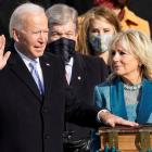 Joe Biden is sworn in as the 46th president of the United States as Jill Biden holds the Bible...