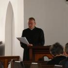Anglican Bishop of Dunedin the Right Rev Dr Steven Benford reads the paperwork to secularise St...