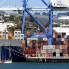 Port Otago is humming, as container vessels Sagitta (left) and Rio Negro unload yesterday while...