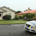 Police cars were seen parked outside a Robertson St address in the Invercargill suburb of...