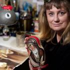 Dunedin artist Kezia Field paints Russian nesting dolls with images of inspirational women to...