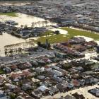 	The grounds of Queen's High School, King's High School and Tonga Park are inundated during the...